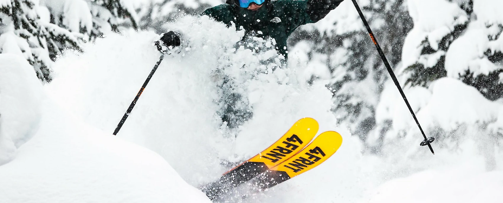 Customer picking up rental ski boots at a ski shop counter